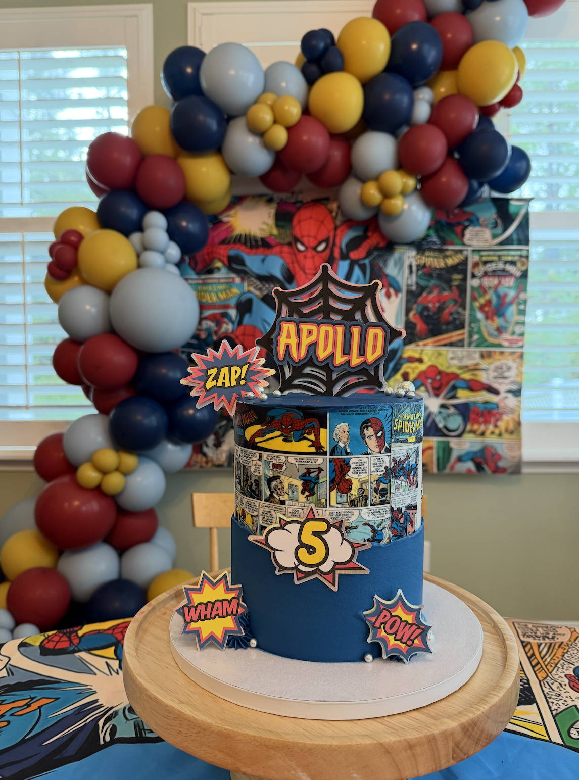 Spiderman cake with red and blue theme